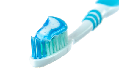 brush with toothpaste