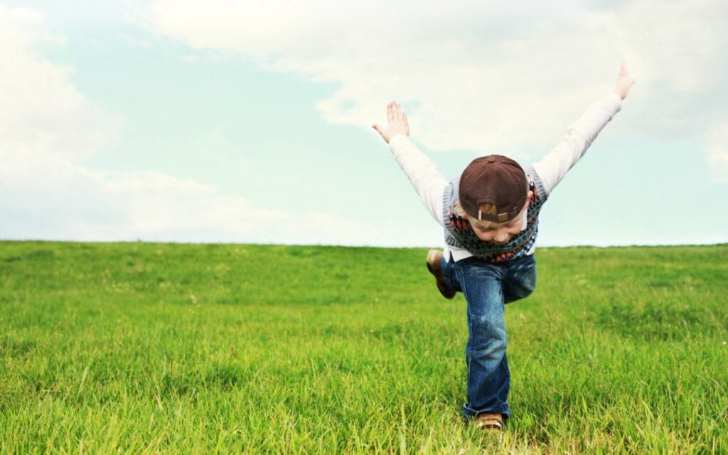 little boy in garden