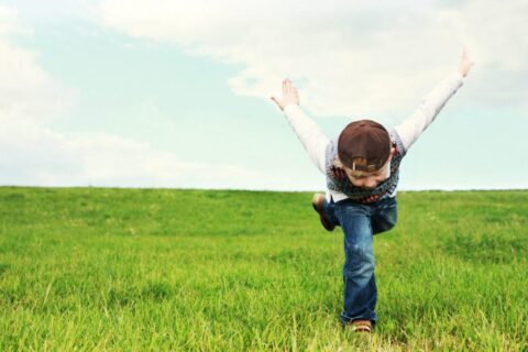 little boy in garden